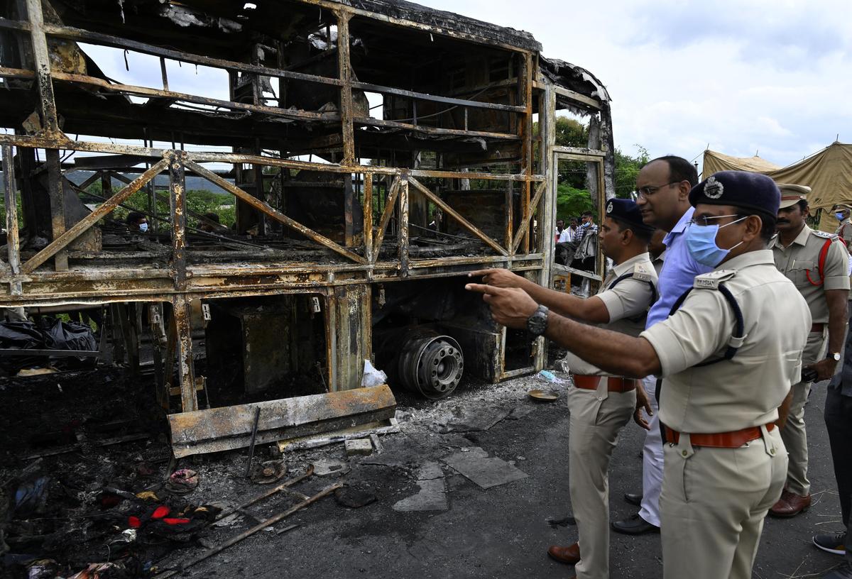 Forensic personnel and police at the accident site. Forensic personnel and police at the accident site.